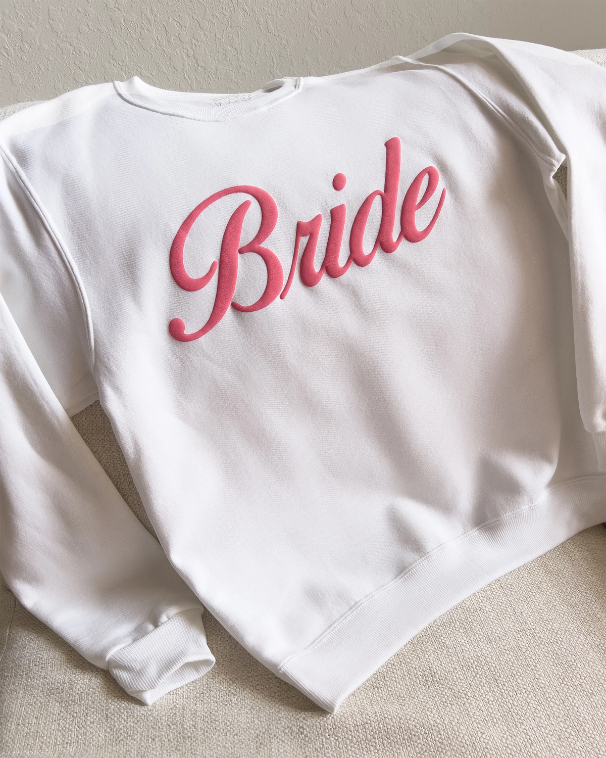 white-sweatshirt-bride-pink-embossed