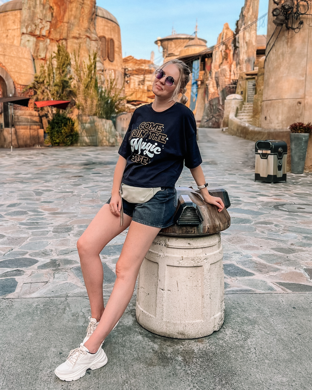 Woman in "Come Join the Magic Side" top at Star Wars: Galaxy's Edge in Disney World.